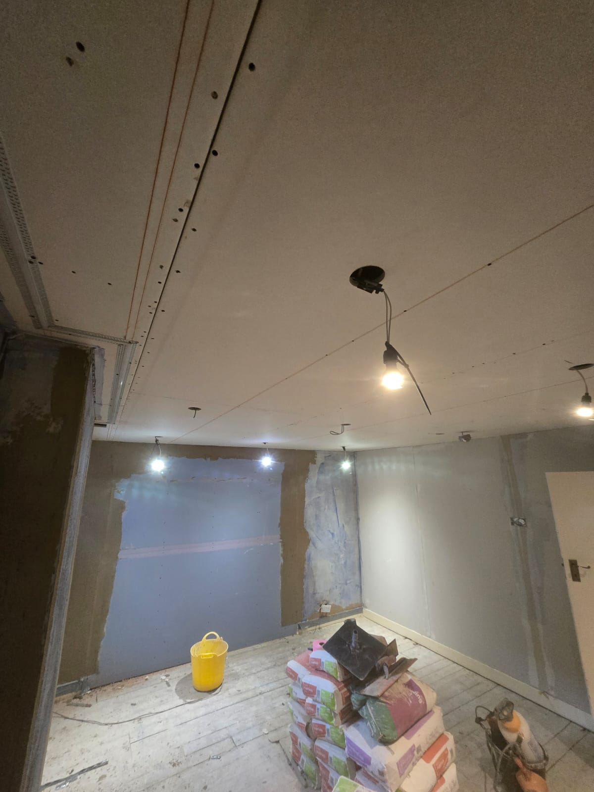 Plasterboarded ceiling and walls in progress